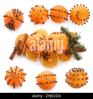 Set aus orangefarbenen Pomanderkugeln auf weißem Hintergrund Stockfoto