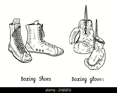 Boxschuhe und Handschuhe. Tusche schwarz-weiße Doodle Zeichnung im Holzschnitt-Stil Stockfoto