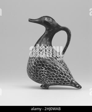 'Tell el-Yahudiya' Vase in Form einer Ente ca. 1700 v. Chr. Mittleres Königreich–frühes Neues Königreich. Vase „Tell el-Yahudiya“ in Form einer Ente. Ca. 1700 V. CHR. Keramik, Rauchschwärzung, weißer Gips. Mittleres Königreich – Frühes Neues Königreich. Aus Ägypten, Oberägypten, Theben, Deir el-Bahri, Grab von Iuy (MMA 61), an der Oberfläche nahe Grab, MMA Ausgrabungen, 1922–23. Späte Dynastie 13-frühe Dynastie 17 Stockfoto