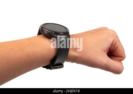 Schwarze Uhr smart auf der Hand isoliert auf dem weißen Stockfoto
