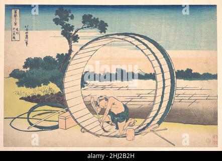 Fujimigahara in der Provinz Owari (Bishū Fujimigahara), aus der Serie 36 Ansichten des Fuji-Berges (Fugaku sanjūrokkei) ca. 1830–32 Katsushika Hokusai Japanese durch die Rahmung von Fuji und dem cooper im Inneren des großen Fasses bewirkt Hokusai einen intimen Dialog zwischen dem ikonischen Berg und dem sinewy Mann. Die Gegenüberstellung von Fuji und dem cooper verleiht der ehrlichen Arbeit und Existenz des Mannes einen religiösen Oberton. Fujimigahara in der Provinz Owari (Bishū Fujimigahara), aus der Serie 36 Ansichten des Fuji-Berges (Fugaku sanjūrokkei) 36500 Stockfoto