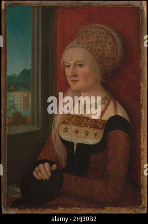 Porträt einer Frau ca. 1510–15 Bernhard Strigel Deutsch Bernhard Strigel gehörte zu einer Künstlerfamilie, die nach der Mitte des 15. Jahrhunderts in der Stadt Memmingen nahe der Schweizer Grenze florierte. In den ersten zwei Jahrzehnten des sechzehnten Jahrhunderts schuf er eine Reihe von Porträts von Frauen in extravaganten Kleidern, die vor einem dekorativen Brokat mit offenem Fenster und Blick auf eine Landschaft angebracht waren. Die Sitterin in diesem (wahrscheinlich unabhängigen) Porträt ist nicht identifiziert worden, aber ihr aufwändiges Kostüm, mit seinen importierten Stoffen und Stickereien und prunkvollen Schmuckstücken, stellt sie auf Stockfoto