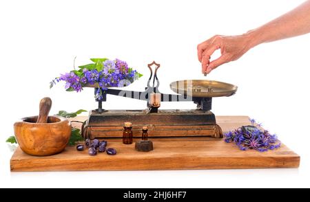 Roberval Balance vor weißem Hintergrund Stockfoto
