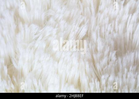 Weiße flauschige Plüsch Stoff strukturierten Hintergrund Stockfoto