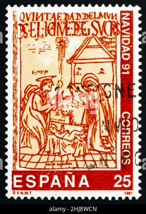 SPANIEN - UM 1991: Eine in Spanien gedruckte Briefmarke zeigt die Geburt Christi, Illustration aus dem 17th. Jahrhundert Buch, Weihnachten, um 1991 Stockfoto