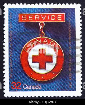 KANADA - UM 1984: Eine in Kanada gedruckte Marke zeigt die Verdienstmedaille, 75th. Jahrestag der kanadischen Rotkreuzgesellschaft, um 1984 Stockfoto