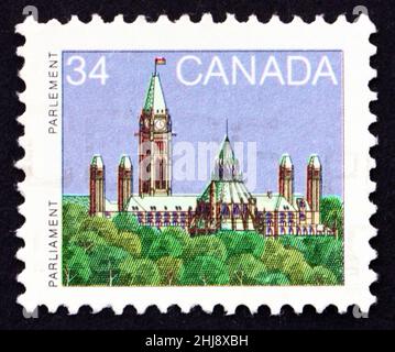 KANADA - UM 1985: Eine in Kanada gedruckte Briefmarke zeigt das Parlament, Bibliothek, um 1985 Stockfoto