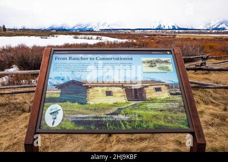 Interpretationsschild über die historische Cunningham Cabin im Grand Teton National Park, Wyoming, USA Stockfoto