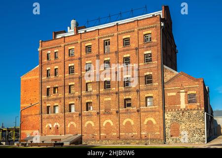 Old Hart's Mill Gebäude, beleuchtet von der Nachmittagssonne in Port Adelaide, Südaustralien Stockfoto