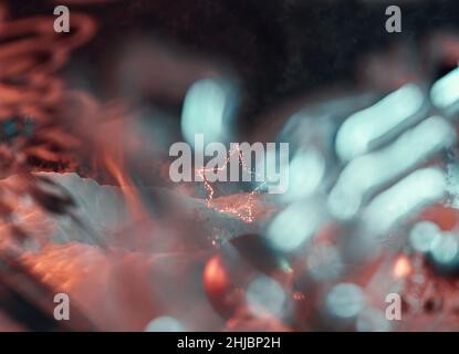 3D Darstellung der beleuchteten Sternform, die auf Schnee steht Stockfoto