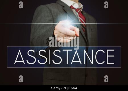 Assistenz - Schriftzug, Geschäftsmann zeigt mit dem Finger Stockfoto