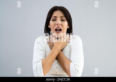 Entzündung Der Nackenschmerzen. Schmerzhafte Kehlkopfkrankheit Stockfoto