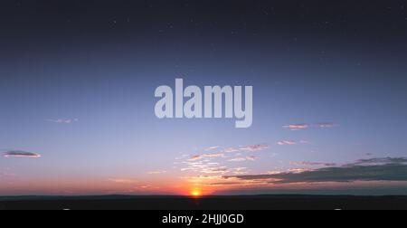 Ein heller, farbenfroher Sonnenuntergang mit kleinen, gesättigten Wolken vor dem Hintergrund des Sternenhimmels. Sterne leuchten bei Sonnenuntergang durch die Atmosphäre Stockfoto