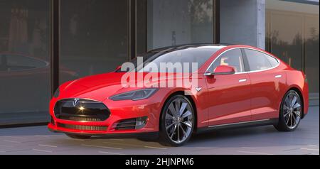 Tesla Model S parkte vor einem modernen Gebäude Stockfoto