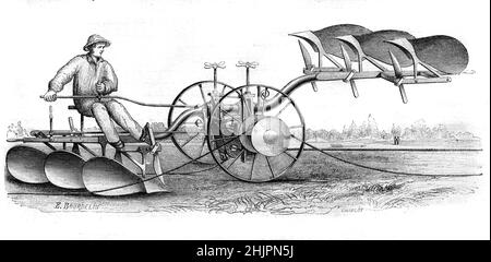 Lotz Plough mit dreifachen Furchen und Winde, die zur Dampfmaschine führen. Vintage Illustration oder Gravur 1865 Stockfoto