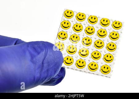 Smiley Face Acid Trips, Blotting-Papier mit dem Medikament L.S.D.- Lyserginsäure Diethylamid imprägniert. Stockfoto