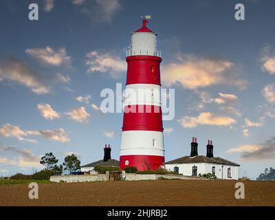 Happisburgh Leuchtturm in Norfolk, England, Großbritannien im Morgengrauen Stockfoto