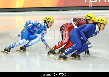 Turin Italien 2006-02-22: Olympische Winterspiele 2006 in Turin, Kurzspurfinalstaffel weiblich 3000MT : Zini Katia, Skaterin der italienischen National Short Track während des Rennens Stockfoto