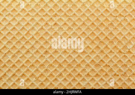 Wafer. Hintergrund der gelben Waffeln Nahaufnahme. Gebäck. Süße Stockfoto