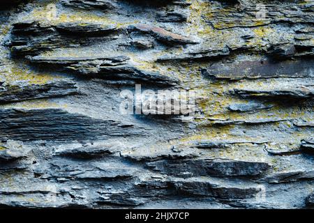 Struktur der Steinwand mit Zement. Steinhintergründe mit grauem Zement. Stockfoto