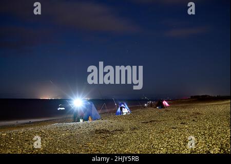 Nachtangeln vor Rossall Beach, Fleetwood, Großbritannien Stockfoto