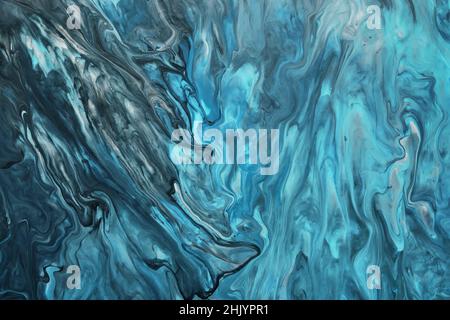 Flüssige Kunst. Flüssige blaue und graue abstrakte Farbe tropft und winkt. Hintergrund oder Textur mit Marmoreffekt. Stockfoto