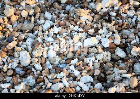 Nahaufnahme von Kieselsteinen in kleinen, regelmäßigen pixelähnlichen Formen. Stockfoto