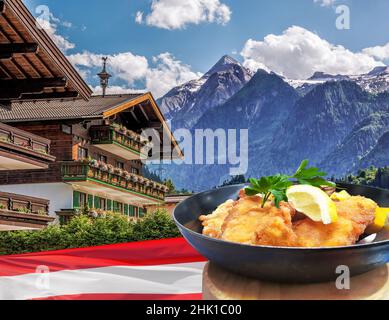 Kaprun Dorf mit Hotel am Kitzsteinhorn Gletscher und mit typischen Gerichten (Schnitzel) in der Region Salzburg, österreichischen Alpen, Österreich Stockfoto