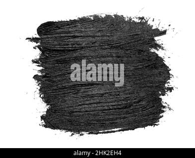 Schwarzer Pinsel streichelt Ölfarben auf weißem Papier. Isoliert auf weißem Hintergrund. Stockfoto