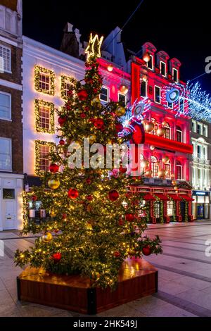 Weihnachtsschmuck in der New Bond Street, London, England, Großbritannien, Europa Stockfoto