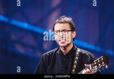 Reinhard Mey, deutscher Liedermacher, singt im ARD Wunschkonzert, Deutschland 1991. Stockfoto