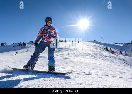 Snowborder, Piste, Trois Vallees, Departement Savoie, Frankreich Stockfoto