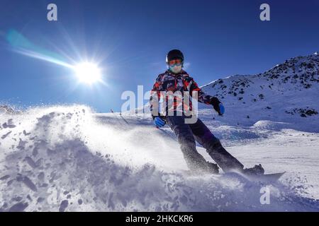 Snowborder, Piste, Trois Vallees, Departement Savoie, Frankreich Stockfoto