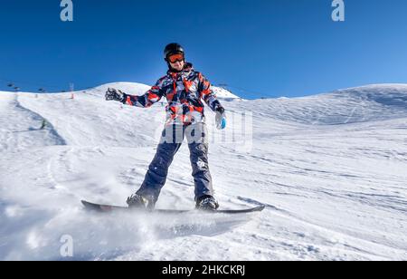 Snowborder, Piste, Trois Vallees, Departement Savoie, Frankreich Stockfoto