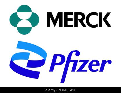 Kiew, Ukraine - 11. November 2021: Merck, Pfizer auf Papier gedruckt. Covid-Pillen, die von den Pharmariesen Merck und Pfizer entwickelt wurden. Die Pillen könnten sinken Stockfoto