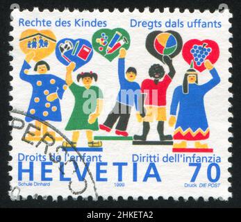 SCHWEIZ - UM 1999: Briefmarke gedruckt von der Schweiz, zeigt Kinder, um 1999 Stockfoto