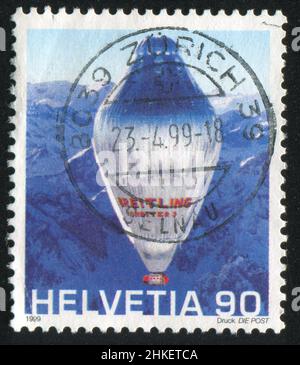 SCHWEIZ - UM 1999: Briefmarke gedruckt von der Schweiz, zeigt Ballonflug, um 1999 Stockfoto