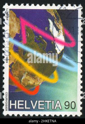 SCHWEIZ - UM 1999: Briefmarke gedruckt von der Schweiz, zeigt Erde, um 1999 Stockfoto