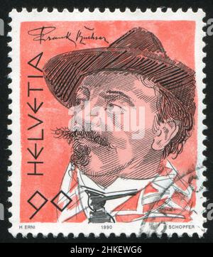 SCHWEIZ - UM 1990: Briefmarke gedruckt von der Schweiz, zeigt Frank Buchser, um 1990 Stockfoto