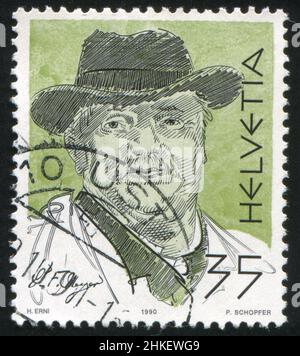 SCHWEIZ - UM 1990: Briefmarke gedruckt von der Schweiz, zeigt Conrad Ferdinand Meyer, um 1990 Stockfoto