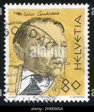 SCHWEIZ - UM 1990: Briefmarke gedruckt von der Schweiz, zeigt Blaise Cendrars, um 1990 Stockfoto
