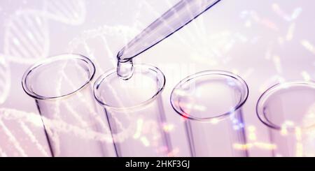 Pipette und Reagenzgläser mit DNA und Chromosomen im Hintergrund Stockfoto