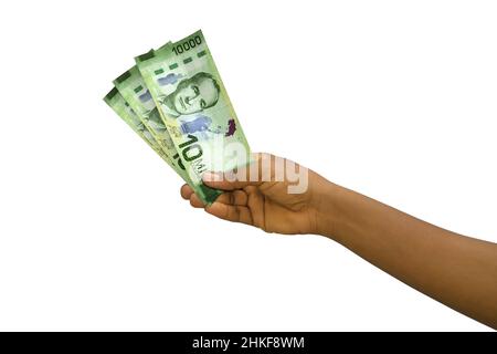 Fair Hand Holding 3D gerenderte 10000 costaricanische Doppelpunkt-Noten isoliert auf weißem Hintergrund Stockfoto