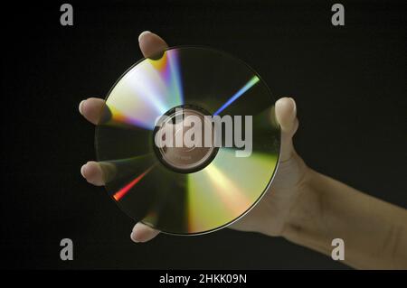 CD-Rom in der Hand Stockfoto