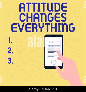 Textschild mit Haltung ändert alles. Geschäftsidee positives Verhalten Erreichen des Geschäftsziels Illustration der Hand mit dem Smartphone Stockfoto