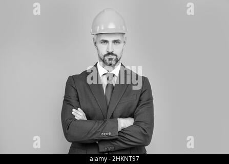 Gestalten Sie Ihre Zukunft. Bauingenieur trägt einen Hut in formalwear. Bauindustrie Stockfoto