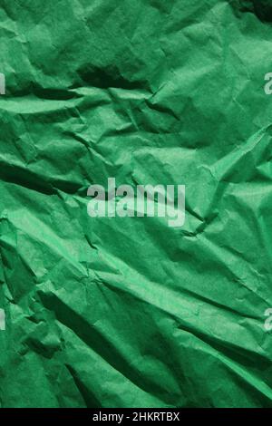 Eine solide grüne Papiertaschentextur Stockfoto