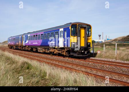 2 Northern Rail class 153 Sprinter trains 153301 + 153351 Passing Sellafield on the Cumbrian Coast Railway line Stockfoto