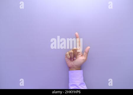 Junger Geschäftsmann in Anzug Point Finger von oben Stockfoto