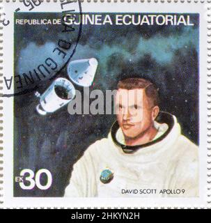 Abgesagte Briefmarke gedruckt von Äquatorialguinea, die David Scott - Apollo 9, um 1978 zeigt. Stockfoto